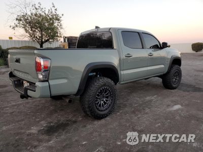 Trzecie zdjęcie samochodu z tyłu: 2023 TOYOTA TACOMA DOUBLE CAB VIN:3TYCZ5ANXPT107370 - miniatura