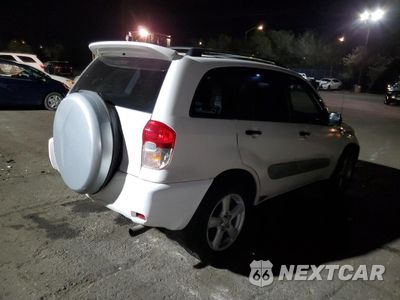 Trzecie zdjęcie samochodu z tyłu: 2001 TOYOTA RAV4 VIN:JTEGH20V410014382 - miniatura