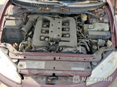 Zdjęcie 11 z 12 samochodu: 2000 DODGE INTREPID ES VIN:2B3HD56J0YH440832 - miniatura