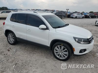 Czwarte zdjęcie samochodu z boku: 2015 VOLKSWAGEN TIGUAN S VIN:WVGAV7AX9FW601399 - miniatura