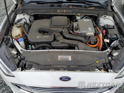 Zdjęcie 11 z 12 samochodu: 2017 FORD FUSION SE HYBRID VIN:3FA6P0LU0HR410092 - miniatura