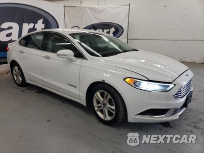 Czwarte zdjęcie samochodu z boku: 2018 FORD FUSION SE HYBRID VIN:3FA6P0LU9JR287009 - miniatura
