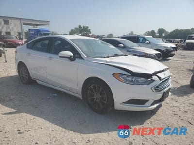 Czwarte zdjęcie samochodu z boku: 2017 FORD FUSION SE VIN:3FA6P0H7XHR164610 - miniatura
