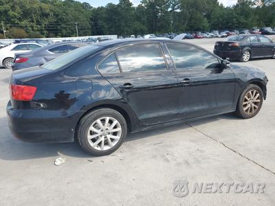 Trzecie zdjęcie samochodu z tyłu: 2012 VOLKSWAGEN JETTA SE VIN:3VWDX7AJ2CM343694 - miniatura