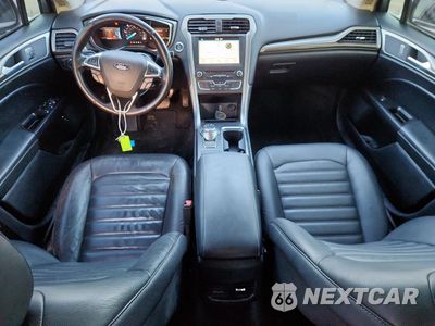Zdjęcie 8 z 12 samochodu: 2017 FORD FUSION SE HYBRID VIN:3FA6P0LU3HR409602 - miniatura