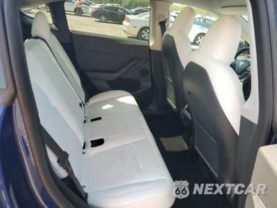 Zdjęcie 10 z 14 samochodu: 2023 TESLA MODEL Y VIN:7SAYGDEF7PF699550 - miniatura