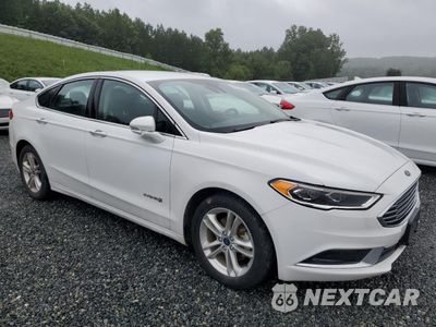 Czwarte zdjęcie samochodu z boku: 2018 FORD FUSION SE HYBRID VIN:3FA6P0LU0JR171794 - miniatura