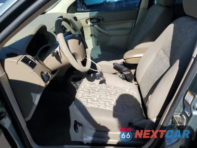 Zdjęcie 7 z 14 samochodu: 2005 FORD FOCUS ZX4 VIN:1FAHP34N05W110059 - miniatura