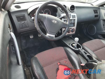 Zdjęcie 8 z 12 samochodu: 2005 HYUNDAI TIBURON GT VIN:KMHHN65F25U160235 - miniatura
