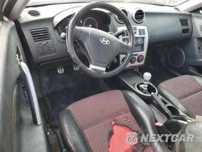 Zdjęcie 8 z 12 samochodu: 2005 HYUNDAI TIBURON GT VIN:KMHHN65F25U160235 - miniatura