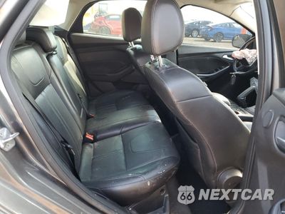 Zdjęcie 10 z 14 samochodu: 2014 FORD FOCUS TITANIUM VIN:1FADP3N26EL230436 - miniatura