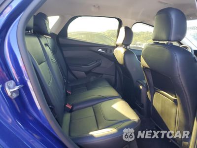 Zdjęcie 10 z 14 samochodu: 2015 FORD FOCUS TITANIUM VIN:1FADP3N28FL254643 - miniatura