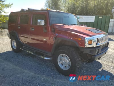 Czwarte zdjęcie samochodu z boku: 2004 HUMMER H2 VIN:5GRGN23U94H122341 - miniatura