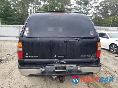 Zdjęcie 6 z 13 samochodu: 2001 CHEVROLET TAHOE K1500 VIN:1GNEK13T41J106837 - miniatura