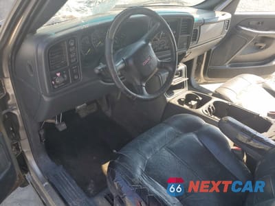 Zdjęcie 8 z 14 samochodu: 2001 GMC NEW SIERRA K1500 VIN:1GTEK19T31Z128300 - miniatura