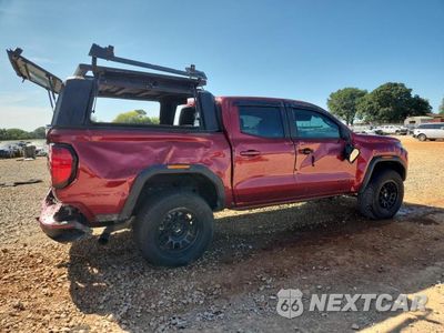 Trzecie zdjęcie samochodu z tyłu: 2024 GMC CANYON AT4 VIN:1GTP6DEK9R1270897 - miniatura