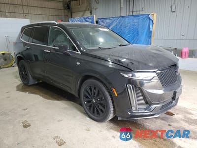 Czwarte zdjęcie samochodu z boku: 2022 CADILLAC XT6 PREMIUM LUXURY VIN:1GYKPDRS0NZ126212 - miniatura