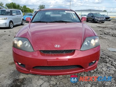 Piąte zdjęcie samochodu w środku: 2005 HYUNDAI TIBURON GT VIN:KMHHN65F25U160235 - miniatura