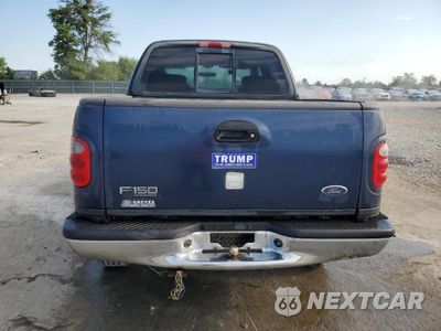 Zdjęcie 6 z 12 samochodu: 2003 FORD F150 SUPERCREW VIN:1FTRW08L73KA57406 - miniatura