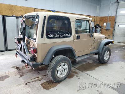 Trzecie zdjęcie samochodu z tyłu: 1999 JEEP WRANGLER / TJ SPORT VIN:1J4FY19S1XP492501 - miniatura
