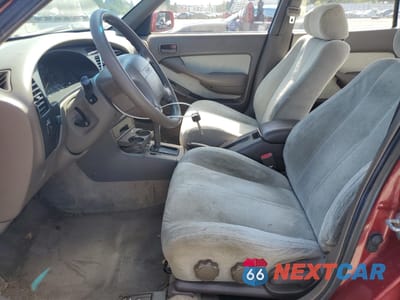 Zdjęcie 7 z 14 samochodu: 1994 TOYOTA CAMRY LE VIN:JT2SK12E1R0262410 - miniatura