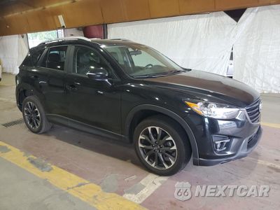 Czwarte zdjęcie samochodu z boku: 2016 MAZDA CX-5 GT VIN:JM3KE4DY3G0806658 - miniatura