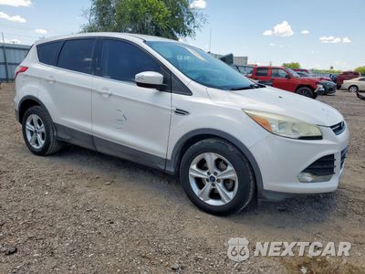 Czwarte zdjęcie samochodu z boku: 2014 FORD ESCAPE SE VIN:1FMCU0GX9EUD16786 - miniatura