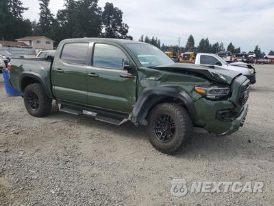 Czwarte zdjęcie samochodu z boku: 2020 TOYOTA TACOMA DOUBLE CAB VIN:5TFCZ5ANXLX229288 - miniatura