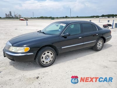 1999 LINCOLN CONTINENTAL 1LNHM97V9XY634170 - główne zdjęcie licytacji z USA - miniatura