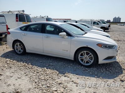 Czwarte zdjęcie samochodu z boku: 2018 FORD FUSION SE HYBRID VIN:3FA6P0LU2JR171697 - miniatura