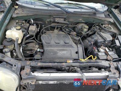 Zdjęcie 12 z 15 samochodu: 2002 FORD ESCAPE XLT VIN:1FMYU04162KA62855 - miniatura