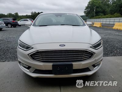 Piąte zdjęcie samochodu w środku: 2017 FORD FUSION SE HYBRID VIN:3FA6P0LU9HR359594 - miniatura