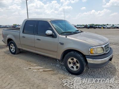 Czwarte zdjęcie samochodu z boku: 2001 FORD F150 SUPERCREW VIN:1FTRW07L61KB97963 - miniatura