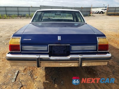 Zdjęcie 6 z 14 samochodu: 1985 OLDSMOBILE DELTA 88 ROYALE BROUGHAM VIN:1G3BY69Y2FY379333 - miniatura