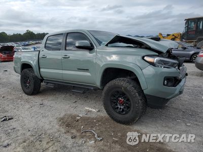 Czwarte zdjęcie samochodu z boku: 2022 TOYOTA TACOMA DOUBLE CAB VIN:3TMCZ5AN9NM510877 - miniatura
