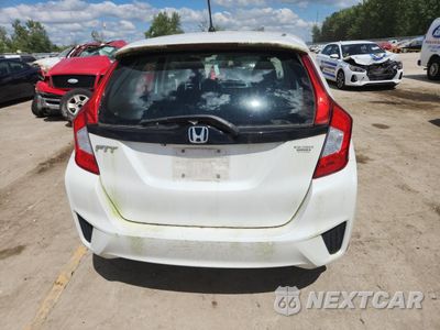 Zdjęcie 6 z 12 samochodu: 2015 HONDA FIT LX VIN:3HGGK5H55FM731214 - miniatura