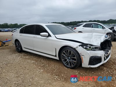 Czwarte zdjęcie samochodu z boku: 2022 BMW 750 XI VIN:WBA7U2C03NCJ17147 - miniatura