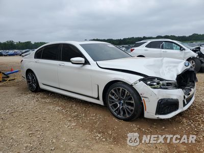 Czwarte zdjęcie samochodu z boku: 2022 BMW 750 XI VIN:WBA7U2C03NCJ17147 - miniatura
