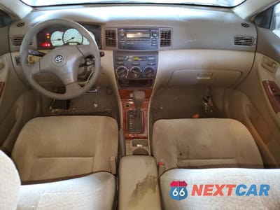 Zdjęcie 8 z 12 samochodu: 2003 TOYOTA COROLLA CE VIN:1NXBR32E43Z013013 - miniatura