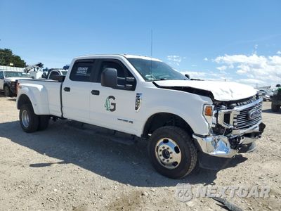 Czwarte zdjęcie samochodu z boku: 2021 FORD F350 SUPER DUTY VIN:1FT8W3DT8MEC84395 - miniatura