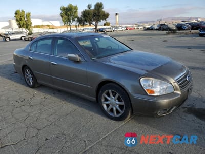 Czwarte zdjęcie samochodu z boku: 2005 INFINITI Q45 VIN:JNKBF01AX5M100863 - miniatura