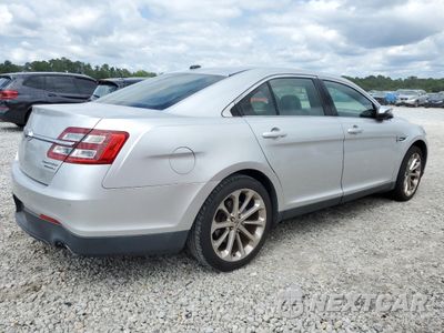 Trzecie zdjęcie samochodu z tyłu: 2014 FORD TAURUS LIMITED VIN:1FAHP2F8XEG102806 - miniatura