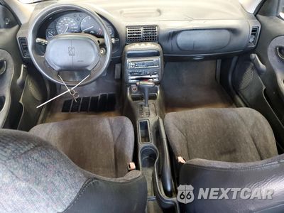 Zdjęcie 8 z 12 samochodu: 1999 SATURN SL1 VIN:1G8ZH5288XZ178819 - miniatura