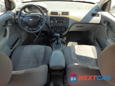 Zdjęcie 8 z 14 samochodu: 2005 FORD FOCUS ZX4 VIN:1FAFP34N35W112850 - miniatura
