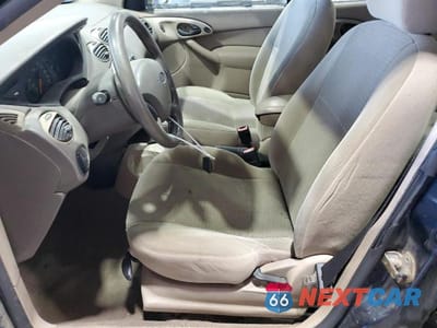 Zdjęcie 7 z 12 samochodu: 2003 FORD FOCUS SE COMFORT VIN:1FAFP34Z43W321353 - miniatura