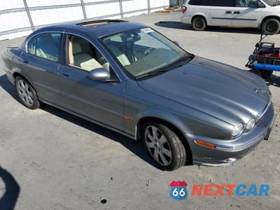 Czwarte zdjęcie samochodu z boku: 2006 JAGUAR X-TYPE 3.0 VIN:SAJWA51A16WE70463 - miniatura