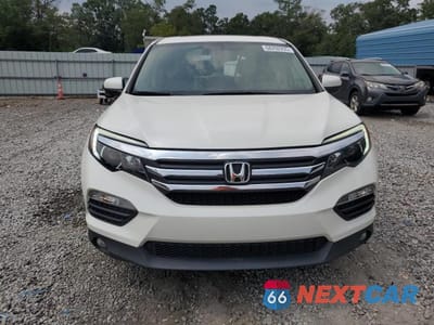Piąte zdjęcie samochodu w środku: 2017 HONDA PILOT EXLN VIN:5FNYF5H71HB009979 - miniatura
