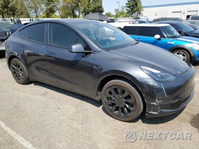 Czwarte zdjęcie samochodu z boku: 2024 TESLA MODEL Y VIN:7SAYGDEE2RF120734 - miniatura