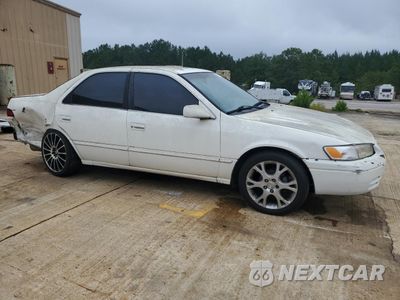 Czwarte zdjęcie samochodu z boku: 1997 TOYOTA CAMRY LE VIN:JT2BG22K9V0074001 - miniatura