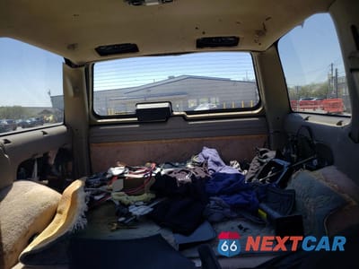 Zdjęcie 10 z 13 samochodu: 1997 CHEVROLET TAHOE K1500 VIN:1GNEK13R4VJ364091 - miniatura